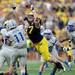 Michigan linebacker Jake Ryan blocks a pass by Air Force Connor Dietz in the fourth quarter at Michigan Stadium on Saturday. Melanie Maxwell I AnnArbor.com